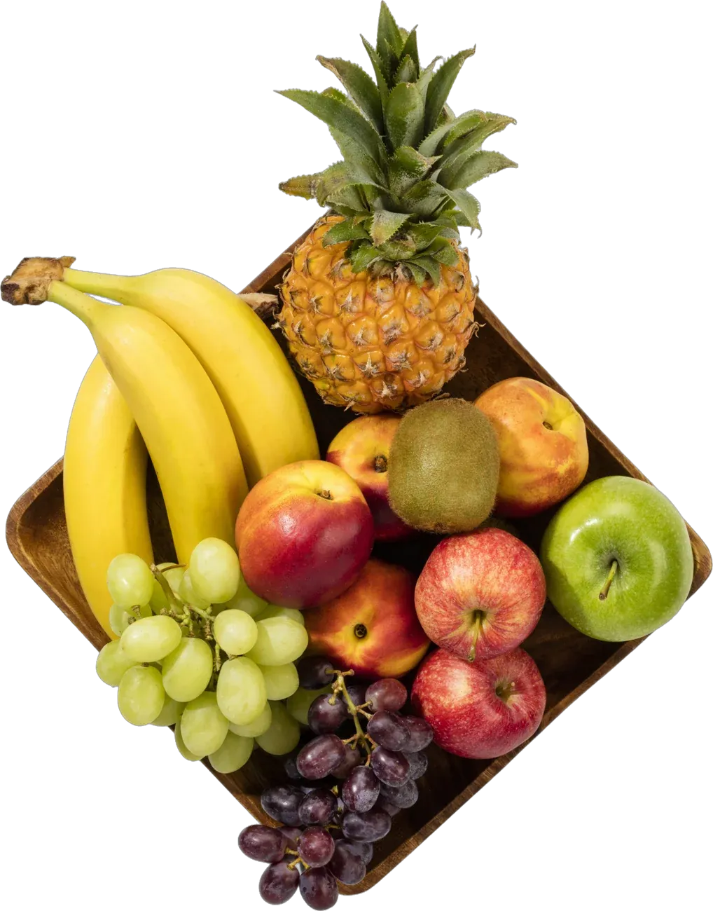 Eckige Holzschale mit Ananas, Bananen, Äpfeln, Kiwi und Trauben